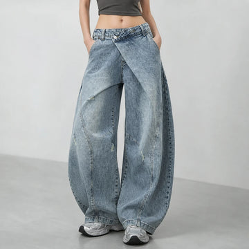Y2K women’s cross-waist baggy jeans, light-wash effect wide-leg denim trousers with decorative rips and asymmetrical stitching, streetwear style, sizes XS‑S‑M‑L YW1587