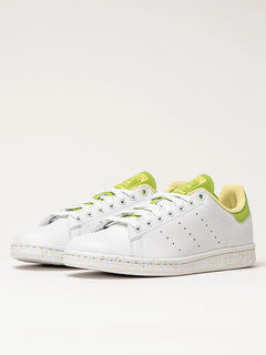 Adidas Stan Smith Disney Tiana and the Frog limited edition women's sneakers, featuring a classic wh