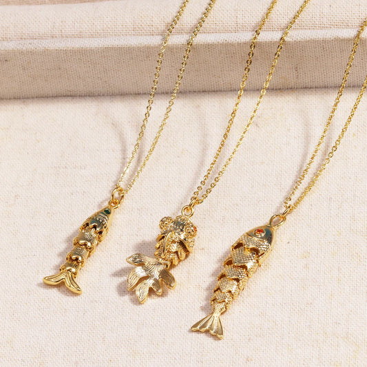 Ciondoli con ciondolo a forma di pesce in acciaio inossidabile pavimenta la collana di pesci dell'oceano con zirconi rossi verdi per le donne Accessori girocollo Regalo per feste unisex