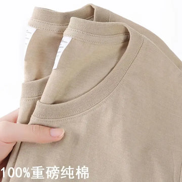 T-shirt in cotone 100% uomo donna tinta unita O collo top a maniche corte estate coreana maglietta a mezza manica allentata unisex M-4XL