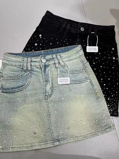 Gonna in denim nera Y2K a trapezio, modello retrò, effetto snellente, con strass a stella, nuova collezione estiva 2026 da donna