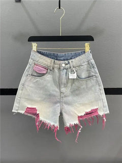 Pantaloncini di jeans con foro rosa stile coreano Donna Estate Nuova vita alta Bordo grezzo A-line Pantaloncini per ragazze calde Pantaloni caldi sottili di nicchia di moda