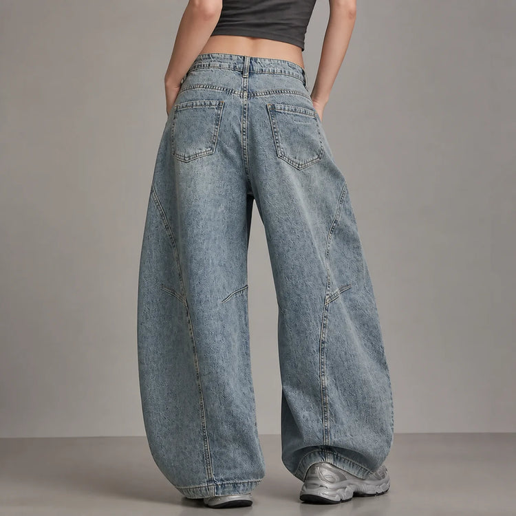 Y2K women’s cross-waist baggy jeans, light-wash effect wide-leg denim trousers with decorative rips and asymmetrical stitching, streetwear style, sizes XS‑S‑M‑L YW1587