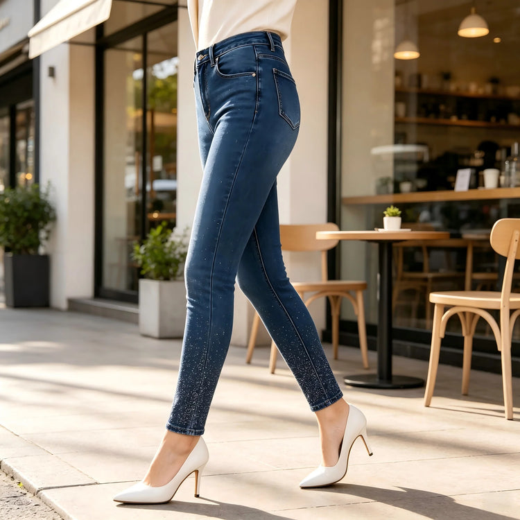 Women’s high-waisted skinny jeans with gradient rhinestones at the ankles, stretchy blue denim, five-pocket trousers in an elegant style, fashionable pieces for evenings and everyday looks, comfortable fabric FX5024