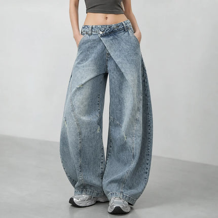 Y2K women’s cross-waist baggy jeans, light-wash effect wide-leg denim trousers with decorative rips and asymmetrical stitching, streetwear style, sizes XS‑S‑M‑L YW1587
