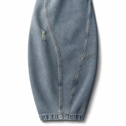 Y2K women’s cross-waist baggy jeans, light-wash effect wide-leg denim trousers with decorative rips and asymmetrical stitching, streetwear style, sizes XS‑S‑M‑L YW1587