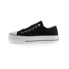 White canvas shoes with platform sole for women, featuring lace closure and comfortable textile lining, ideal for casual and outdoor use, perfect as versatile footwear. PlatiNum