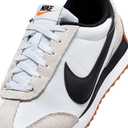 Nike Revolution 8 men's sneakers, featuring a breathable mesh upper and foam midsole for cushioning, with a weight of approximately 292g and a 10mm drop, perfect for running and casual wear in Midnight Navy/White/Black/Pure P