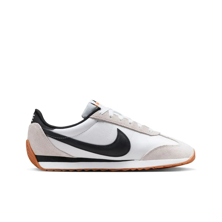 Nike Revolution 8 men's sneakers, featuring a breathable mesh upper and foam midsole for cushioning, with a weight of approximately 292g and a 10mm drop, perfect for running and casual wear in Midnight Navy/White/Black/Pure P