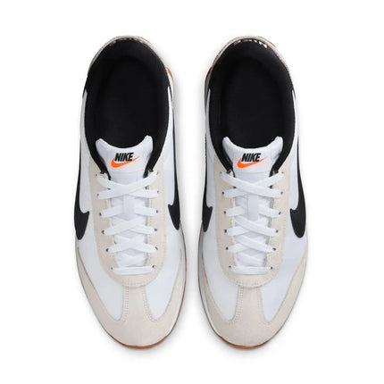 Nike Revolution 8 men's sneakers, featuring a breathable mesh upper and foam midsole for cushioning, with a weight of approximately 292g and a 10mm drop, perfect for running and casual wear in Midnight Navy/White/Black/Pure P
