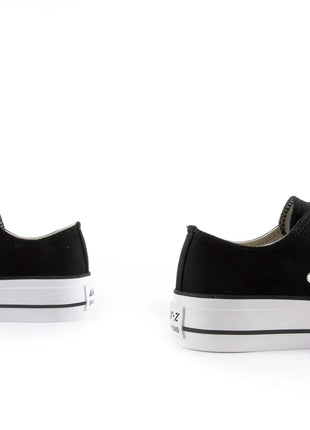 White canvas shoes with platform sole for women, featuring lace closure and comfortable textile lining, ideal for casual and outdoor use, perfect as versatile footwear. PlatiNum