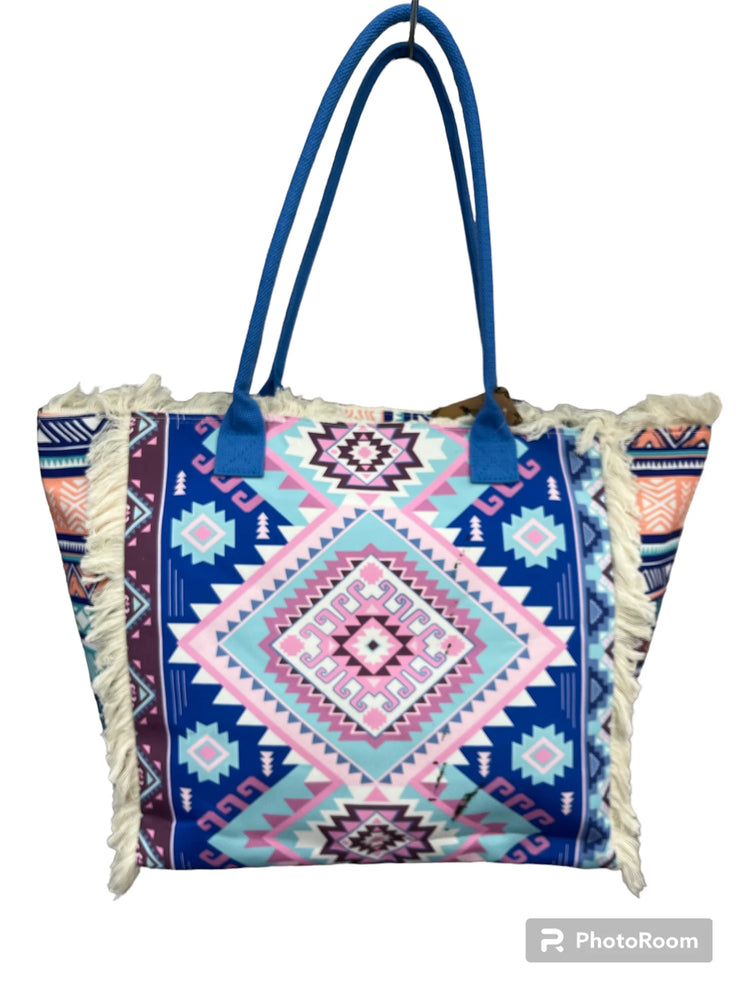 MIGLIORATA Borsa grande da spiaggia o piscina con stampe originali e frange di nappine in cotone bianco, dimensioni 55*37*19 cm. Dotata di tasche interne e fodera. Tessuto 100% poliestere.