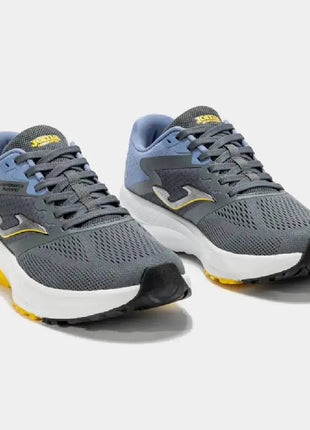 Joma R.Speed Men 2512 Grey Running Shoes offer excellent traction and cushioning, designed for men's training and asphalt races, featuring breathable mesh lining and rubber material for enhanced durability. PlatiNum