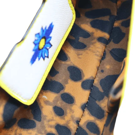 Borsa a tracolla con manico, decorata con Maioliche siciliane e fiori su sfondo giallo, disponibile in 2 misure.