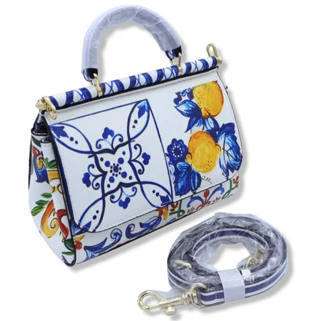 Borsa a tracolla con manico, decorazione in Maioliche siciliane e Limoni su sfondo bianco, disponibile in 2 misure.