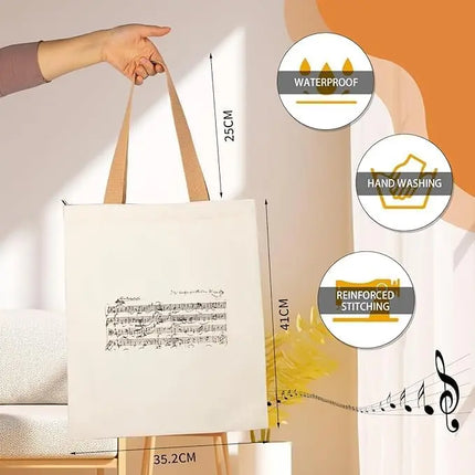 Borsa tote con cerniera dal design ispirato a Mozart e alle partiture di musica classica. Ampia capacità e design compatto.