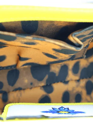 Borsa a tracolla con manico, decorata con Maioliche siciliane e fiori su sfondo giallo, disponibile in 2 misure.