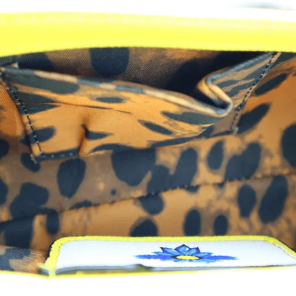 Borsa a tracolla con manico, decorata con Maioliche siciliane e fiori su sfondo giallo, disponibile in 2 misure.