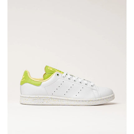 Adidas Stan Smith Disney Tiana and the Frog limited edition women's sneakers, featuring a classic white upper with green accents, comfortable lightweight cushioning, and a sustainable sole made from recycled materials. PlatiNum