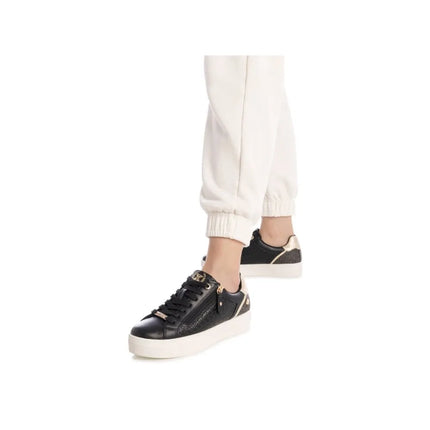 Sneakers Xti 144371 Women's Black Shoes, comfortable lace-up sneakers with a flat platform sole, ideal for casual and outdoor wear, featuring a versatile design for women.