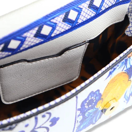 Borsa a tracolla con manico, decorazione in Maioliche siciliane e Limoni su sfondo bianco, disponibile in 2 misure.
