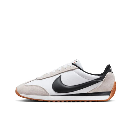 Nike Revolution 8 men's sneakers, featuring a breathable mesh upper and foam midsole for cushioning, with a weight of approximately 292g and a 10mm drop, perfect for running and casual wear in Midnight Navy/White/Black/Pure P