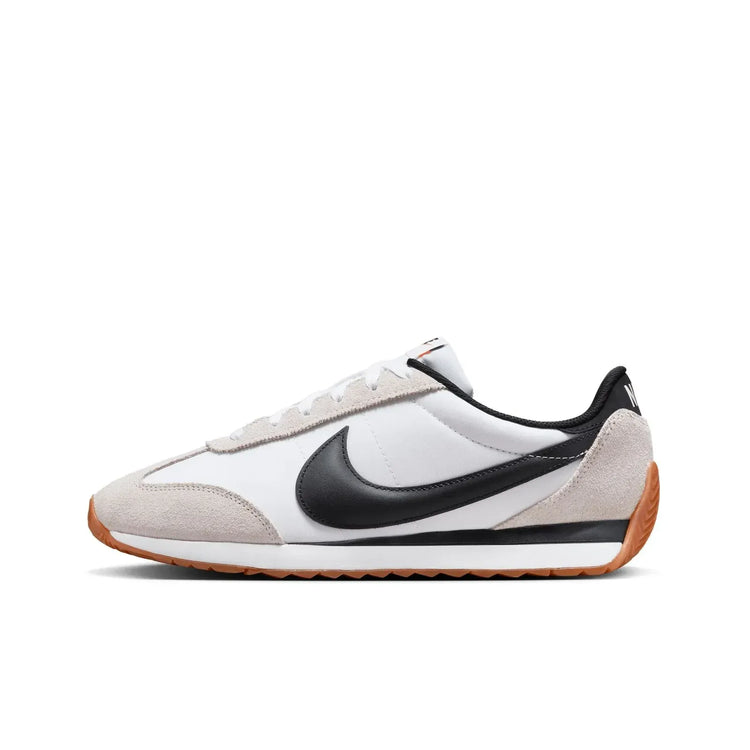 Nike Revolution 8 men's sneakers, featuring a breathable mesh upper and foam midsole for cushioning, with a weight of approximately 292g and a 10mm drop, perfect for running and casual wear in Midnight Navy/White/Black/Pure P