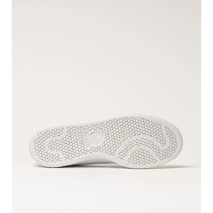 Adidas Stan Smith Disney Tiana and the Frog limited edition women's sneakers, featuring a classic white upper with green accents, comfortable lightweight cushioning, and a sustainable sole made from recycled materials. PlatiNum