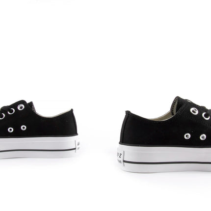 White canvas shoes with platform sole for women, featuring lace closure and comfortable textile lining, ideal for casual and outdoor use, perfect as versatile footwear. PlatiNum