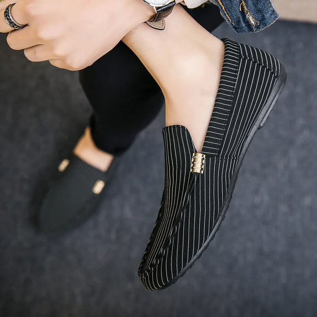 Mocassini uomo primavera estate taglie forti scarpe Casual piatte comode leggere uomo Slip traspirante su scarpe da guida in morbida pelle