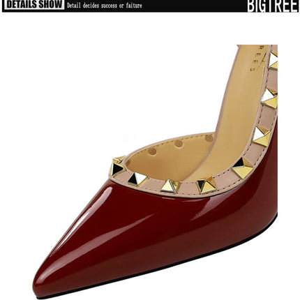 Décolleté da donna sexy con design a rivetto Tacchi alti da donna Décolleté da donna in pelle verniciata a spillo da 10,5 cm Scarpe da banchetto di lusso Taglie forti 43 platinumshop