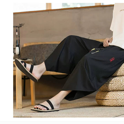 Pantaloncini da samurai giapponesi Kimono estivo da uomo Pantaloni da bagno tradizionali Abbigliamento asiatico da uomo allentato casual Pantaloni a gamba larga Yukata neri