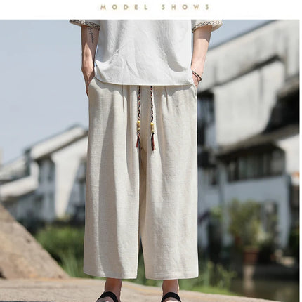 Pantaloncini larghi da uomo Pantaloni casual traspiranti estivi Gamba larga in cotone di lino Taglie forti 5XL Pantaloni Harajuku comodi da esterno da uomo