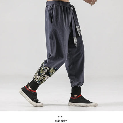 Pantaloni da uomo Costume da samurai giapponese Ukiyo-e Cintura con stampa Pantaloni stile harem da uomo in cotone e lino Pantaloni casual Harajuku da uomo Taglie forti 5XL