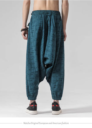 Pantaloni a gamba larga da uomo in cotone e lino casual oversize Harajuku pantaloni alla moda da uomo samurai giapponese retrò Ukiyo-e stampa pantaloni con cintura da uomo