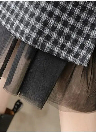 Woolen plaid skirt autumn and winter 2025 new plaid foreign style small man a word hip wrap medium and long skirt PlatiNum