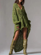 Rib-knit dress with V-neck, deep neckline, loose fit, mini skirt with hem