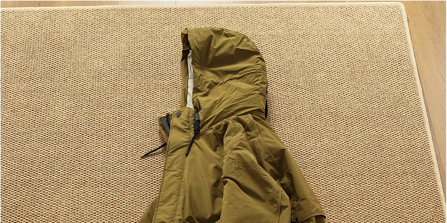 Piumino cargo imbottito in piuma d'anatra di media lunghezza retrò americano nuovo inverno con cappuccio Trench oversize spesso alla moda da uomo