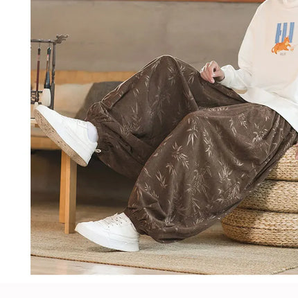 Pantaloni di alta qualità per uomo stile cinese fiore scuro velluto a coste Bloomers casual elastico in vita moda pantaloni larghi a gamba larga maschile