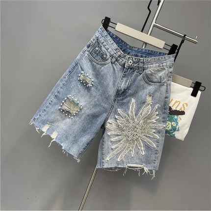 Pantaloncini di jeans con foro sfilacciato floreale con perline alla moda Pantaloncini casual estivi da donna a vita alta in tinta unita stile coreano
