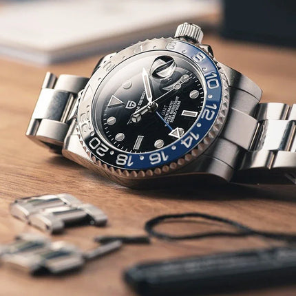 TOP PAGANI DESIGN PD1662 GMT Orologio meccanico automatico da uomo Cinturino in acciaio inossidabile Anello in ceramica blu Quadrante bianco Resistente all'acqua fino a 100 m Orologi da polso sportivi da uomo luminosi per uom