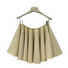 A light yellow high-waisted short skirt with ruffled edges and a double-sided wool A-line skirt, looking cute and playful PlatiNum