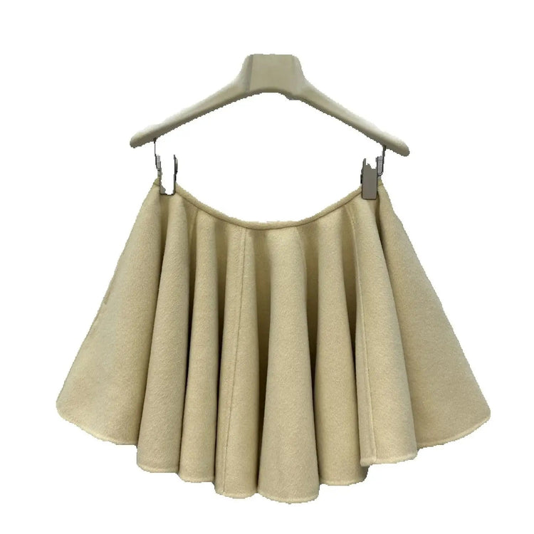 A light yellow high-waisted short skirt with ruffled edges and a double-sided wool A-line skirt, looking cute and playful PlatiNum