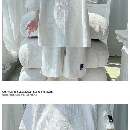 Abito di moda maschile bello set con pantaloncini a maniche corte jacquard sportivi casual larghi Set da due pezzi 2025 Primavera ed estate platinumshop