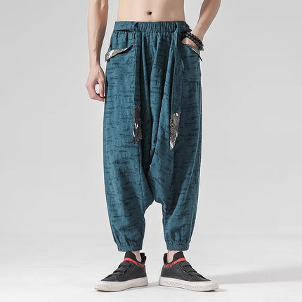 Pantaloni a gamba larga da uomo in cotone e lino casual oversize Harajuku pantaloni alla moda da uomo samurai giapponese retrò Ukiyo-e stampa pantaloni con cintura da uomo