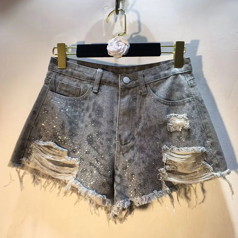2025 Abiti estivi, Nuovi pantaloncini di jeans con bordo ruvido indossato a vita alta con perforazio