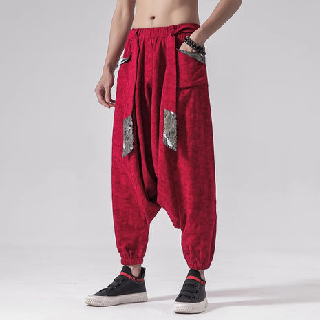 Pantaloni a gamba larga da uomo in cotone e lino casual oversize Harajuku pantaloni alla moda da uomo samurai giapponese retrò Ukiyo-e stampa pantaloni con cintura da uomo