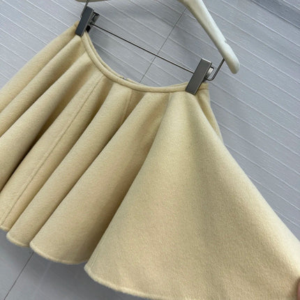 A light yellow high-waisted short skirt with ruffled edges and a double-sided wool A-line skirt, looking cute and playful PlatiNum