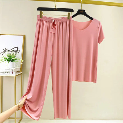 Completo due pezzi da donna: top e pantaloni. Set estivo due pezzi, abiti da donna per vacanze, nuova collezione 2026, pantaloni a gamba larga, eleganti e casual. platinumshop