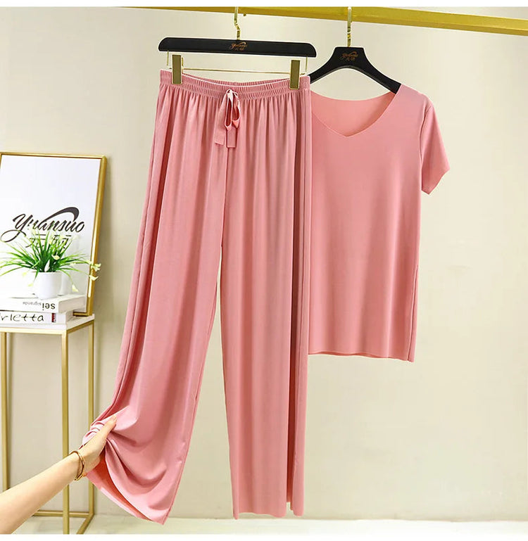 Completo due pezzi da donna: top e pantaloni. Set estivo due pezzi, abiti da donna per vacanze, nuova collezione 2026, pantaloni a gamba larga, eleganti e casual. platinumshop